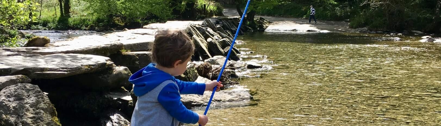 river, small boy, fishing net