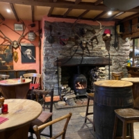 pub, fireplace, tables